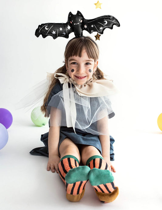Mise en situation portée en accessoire de tête du ballon aluminium petite chauve-souris