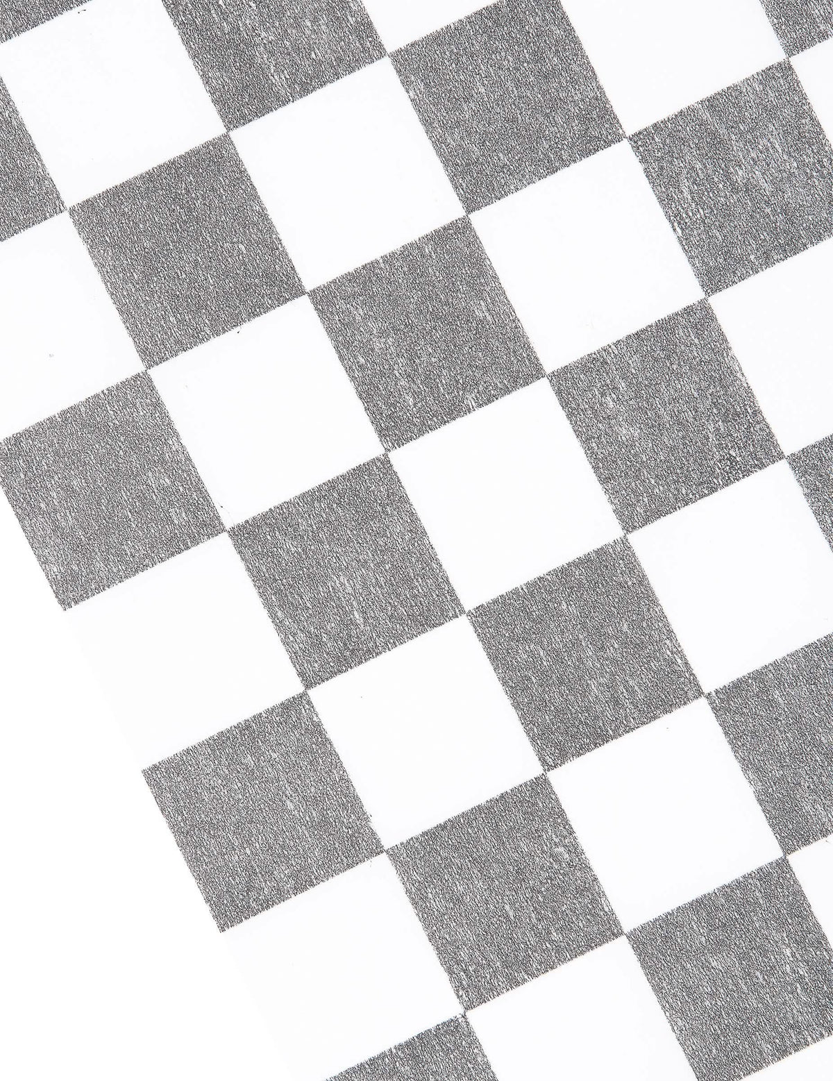 Détail du motif du chemin de table intissé damier
