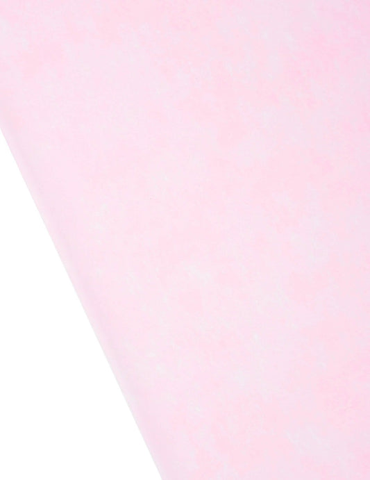 Gros plan sur la texture du chemin de table intissé rose clair