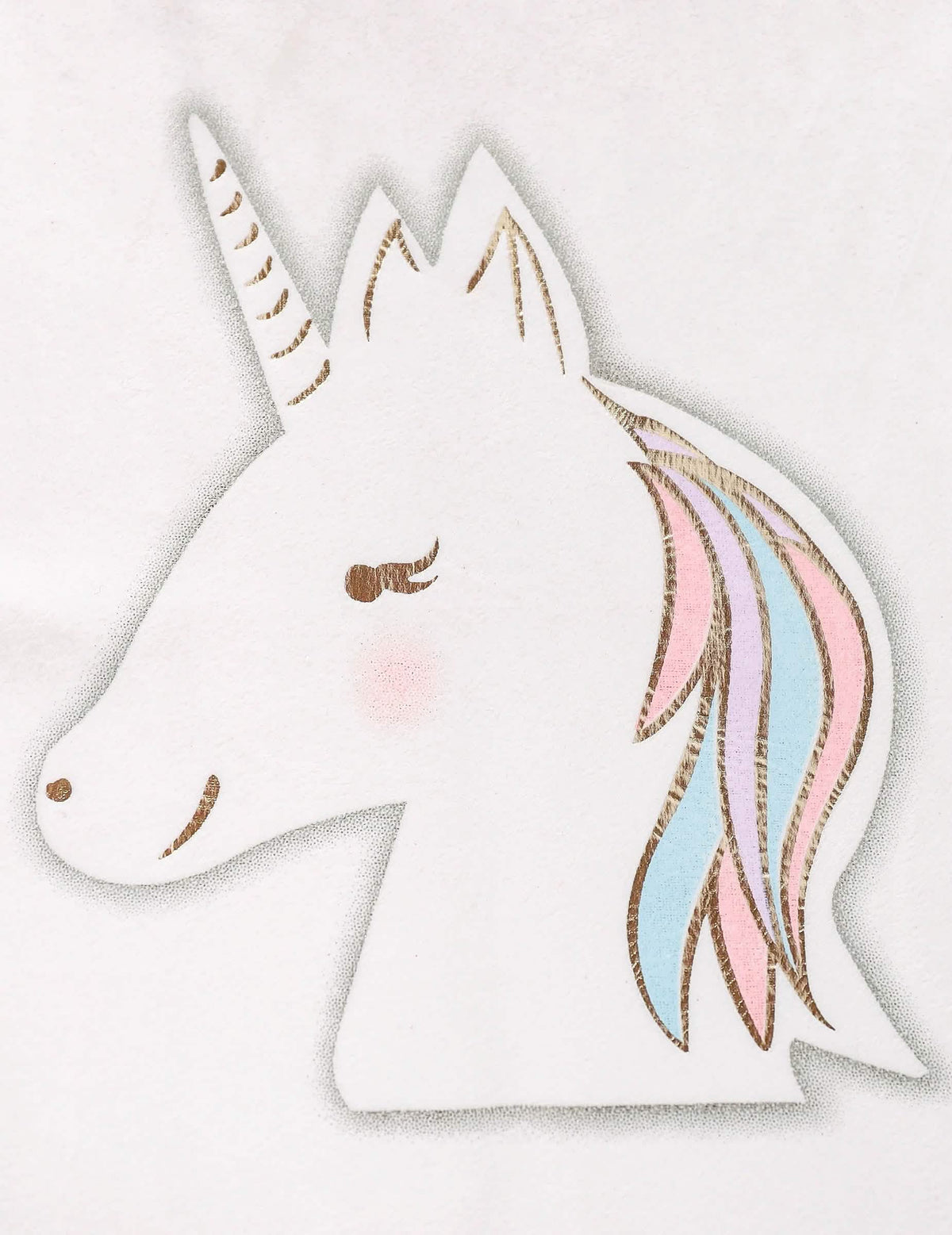 Gros plan sur la tête de licorne du chemin de table licorne pastel