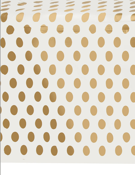 Détail du motif de la nappe en plastique à pois dorés pour fête et anniversaire