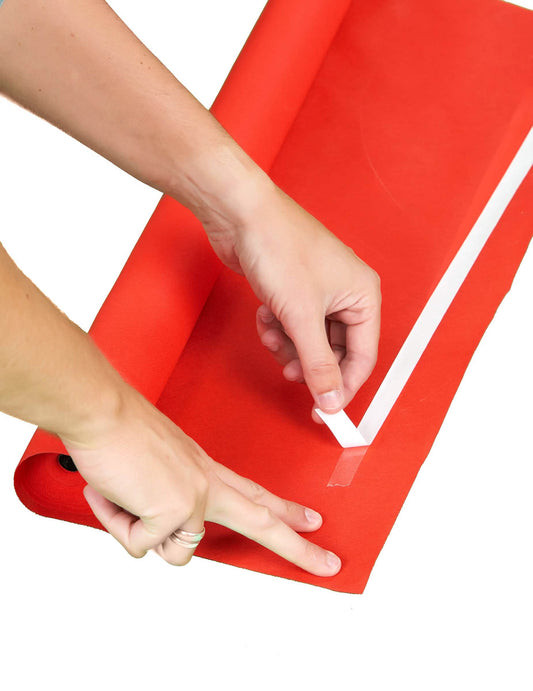 Détail de la bande adhésive du tapis rouge VIP pour fête