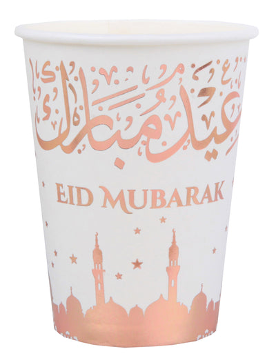 Mise en situation sur une table de fête du gobelet en carton Eid Mubarak pour l'aïd rose gold