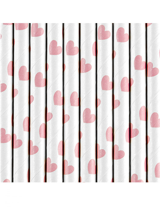 Gros plan sur les motifs de cœurs roses des pailles en carton Saint-Valentin