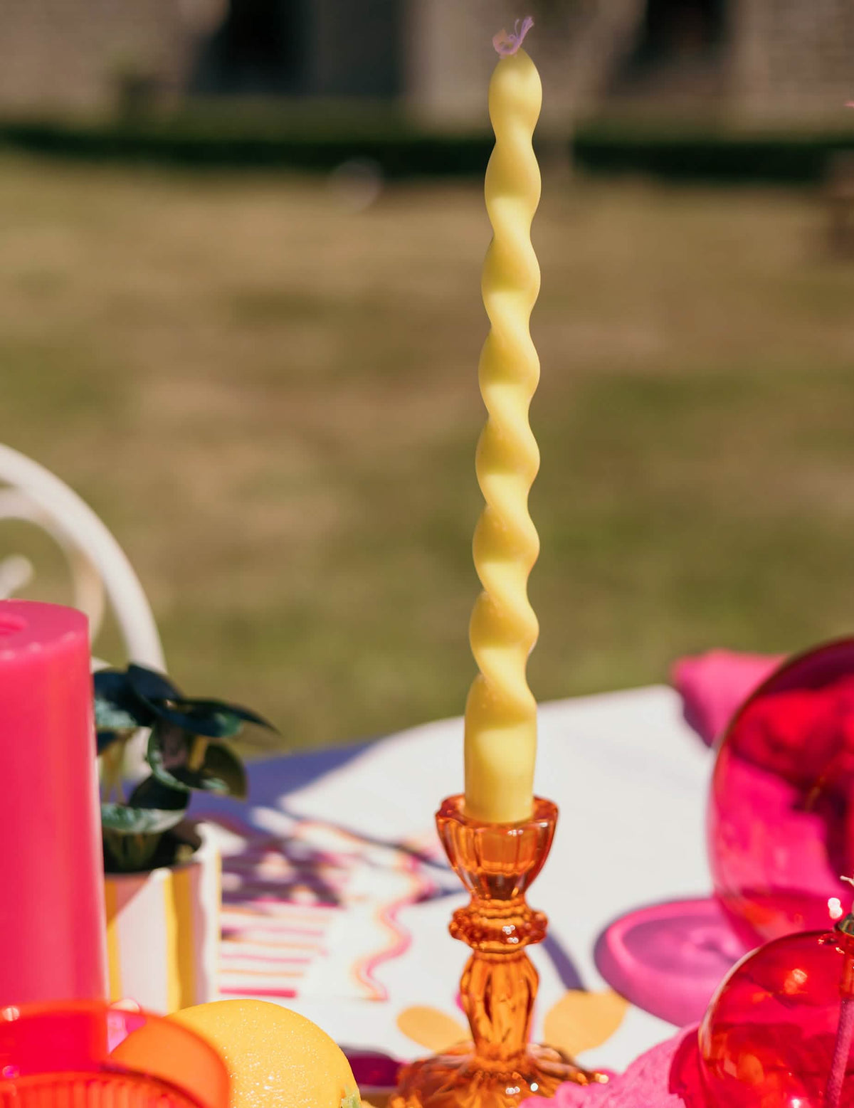 3 Glas-Kerzenständer in Rosa, Gelb und Orange