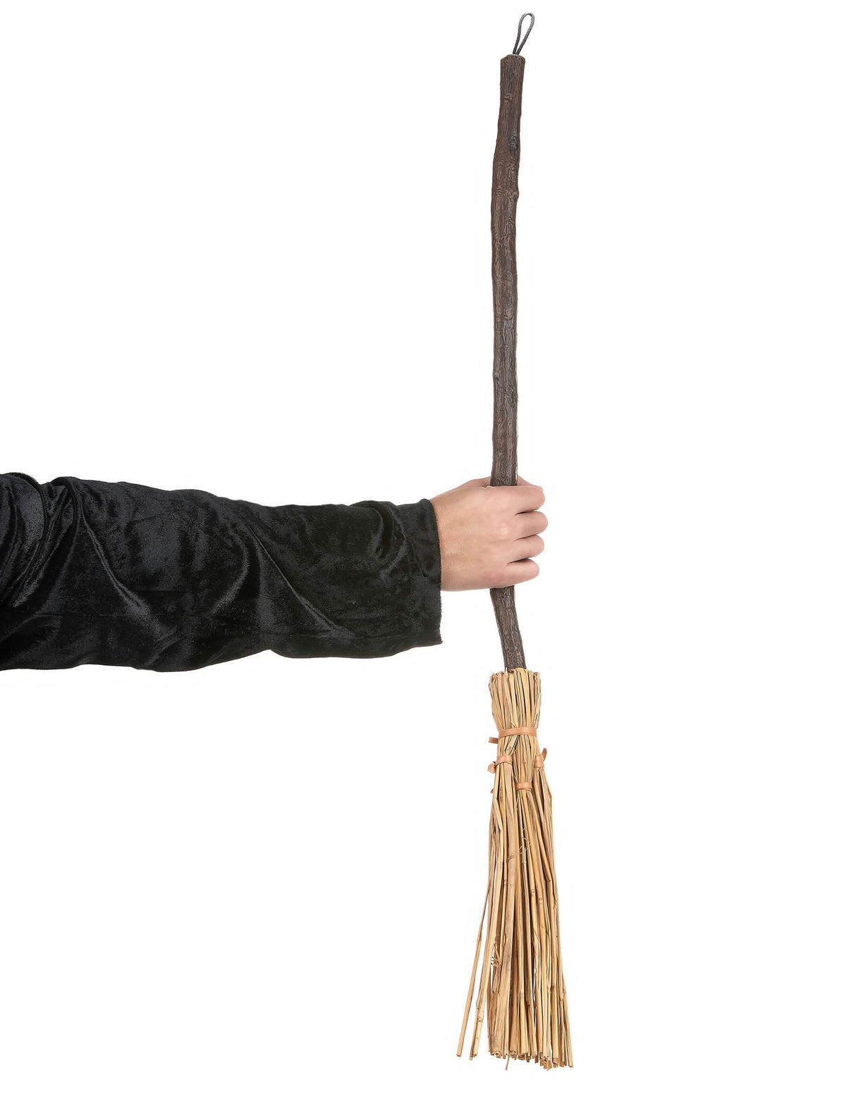 Inszenierung des von einer Hand gehaltenen Hexenbesens