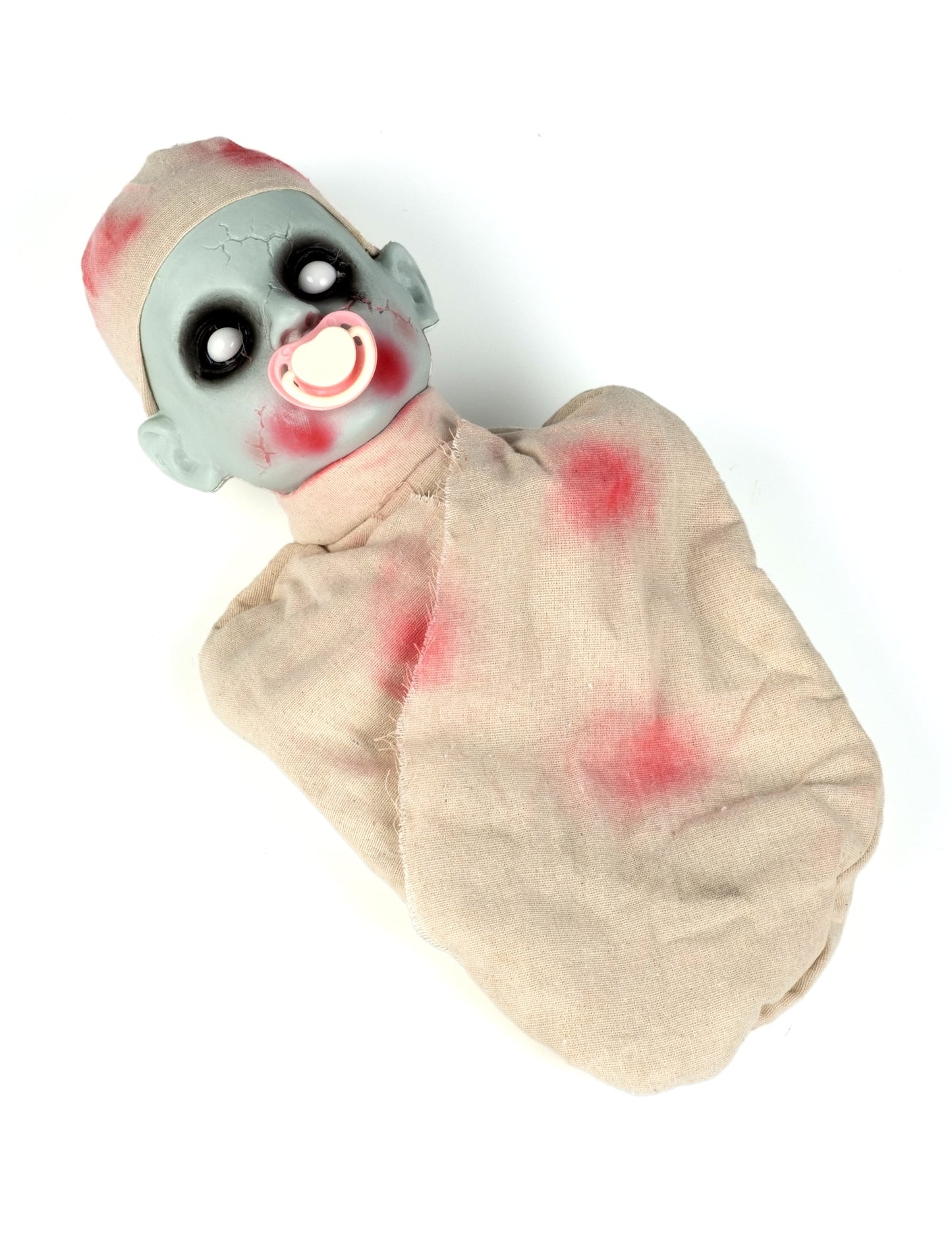 Bébé zombie ensanglanté pour Halloween gris lumineux et sonore avec tétine
