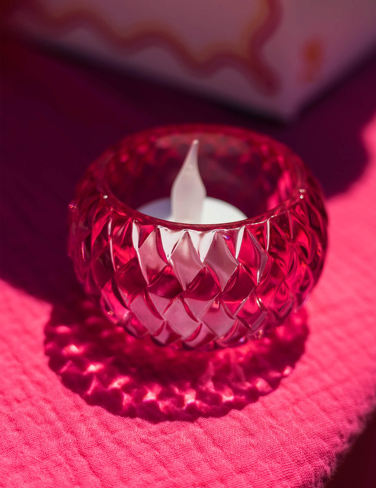 Kerzenhalter aus rosa Kristallglas