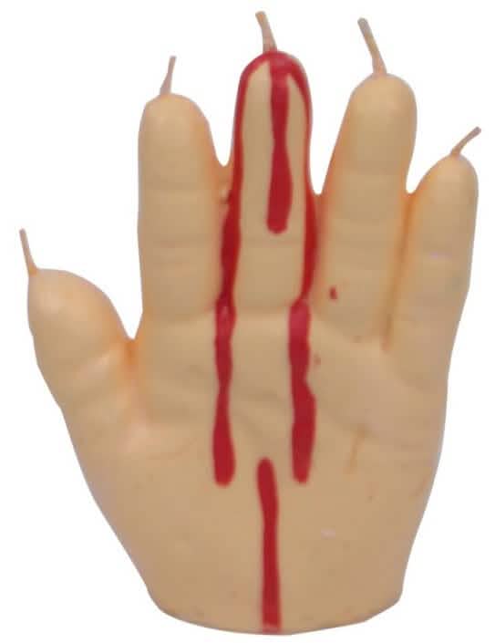 Kerze in Form einer blutenden Hand in hautfarbener Farbe mit roten Bluttropfen