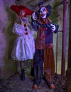 Clown démoniaque animé pour Halloween noir et orange rayé avec chapeau haut de forme