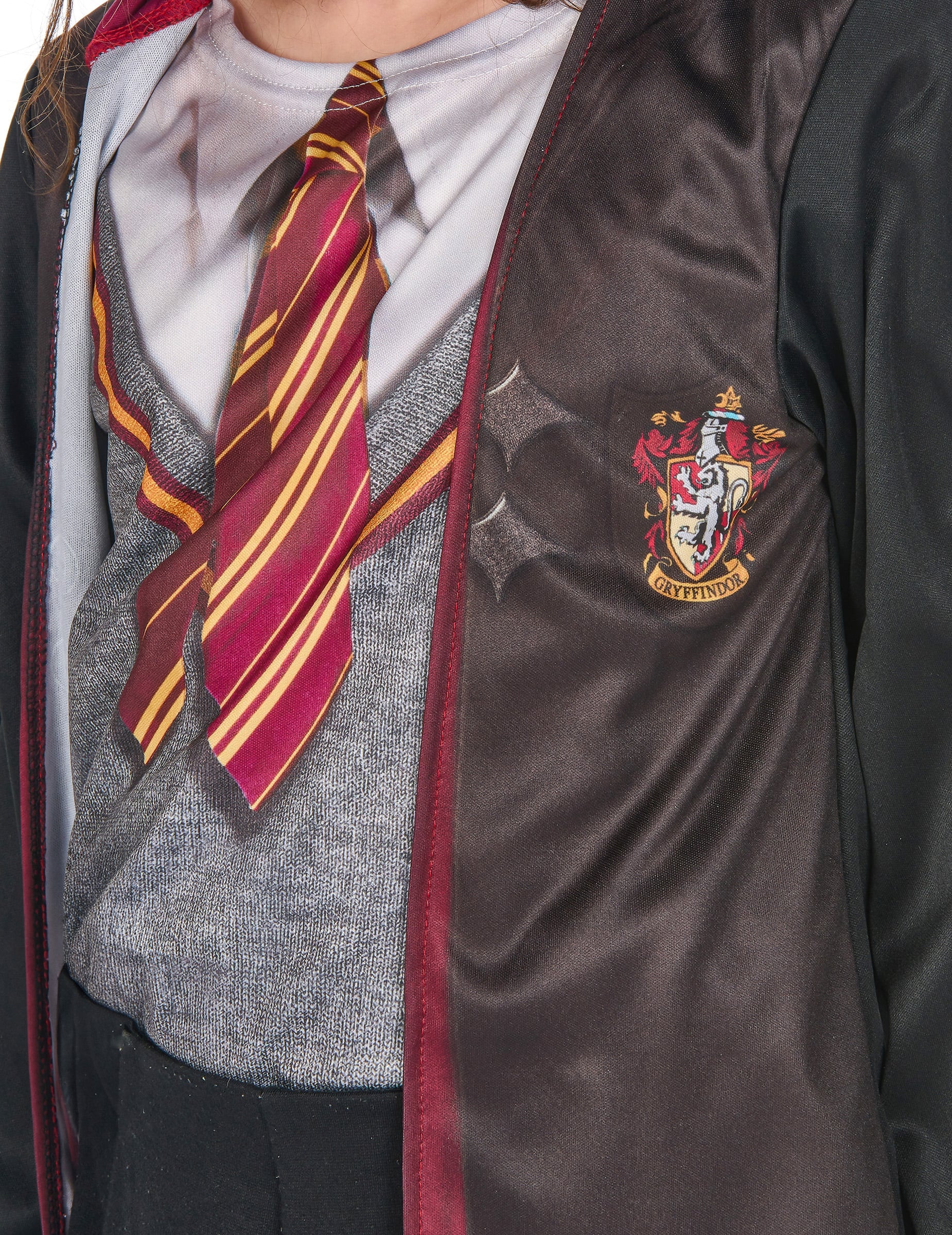 Détail de l'écusson Gryffondor et de la cravate du coffret déguisement et accessoires Harry Potter