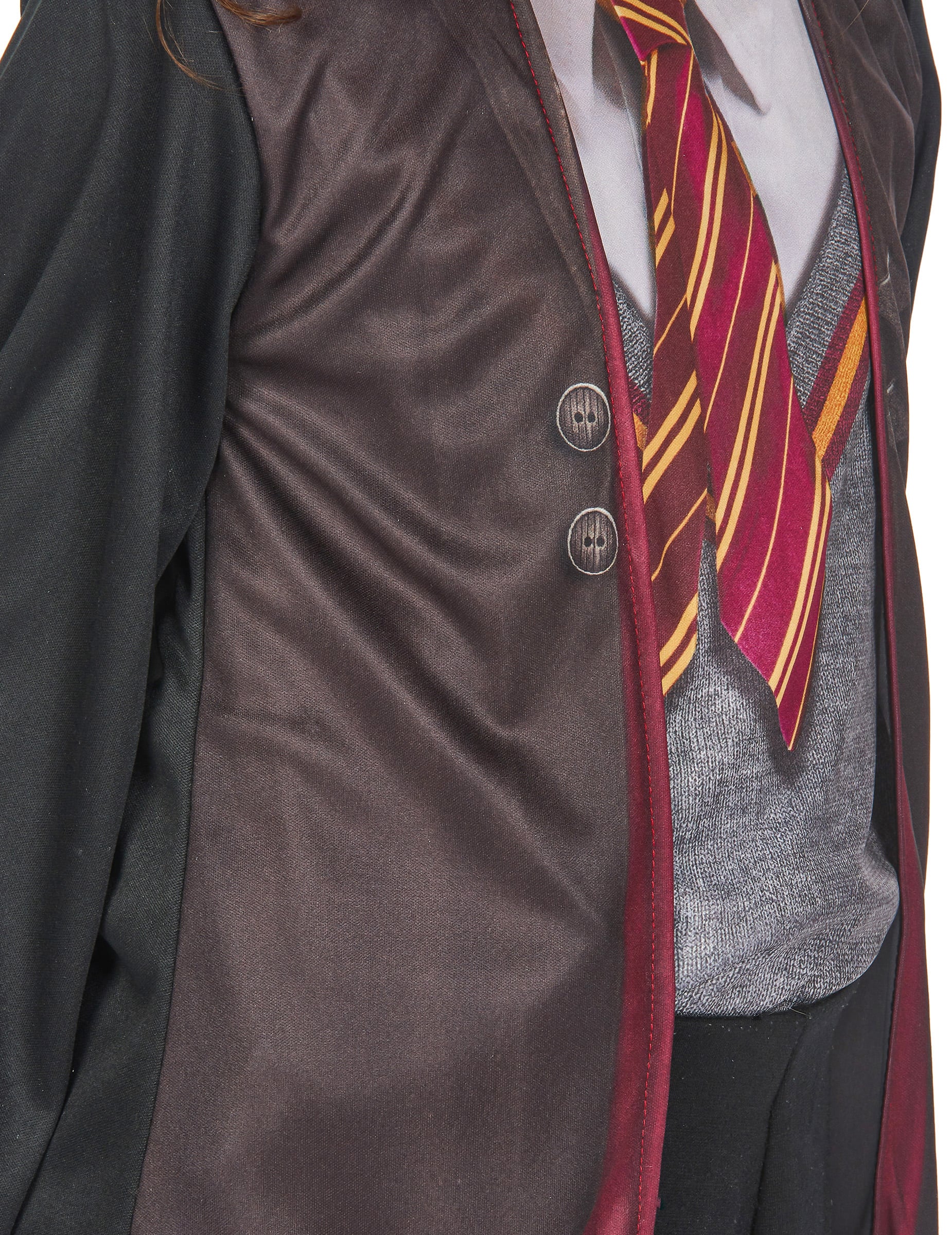 Gros plan sur les boutons imprimés et la cravate du coffret déguisement et accessoires Harry Potter