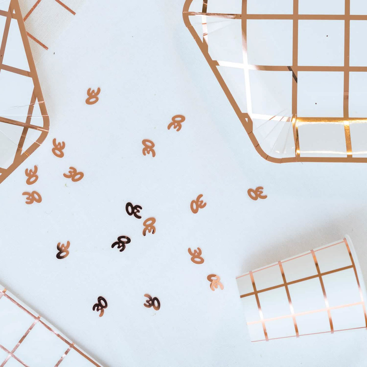 Confettis de table 30 ans rose gold étincelants