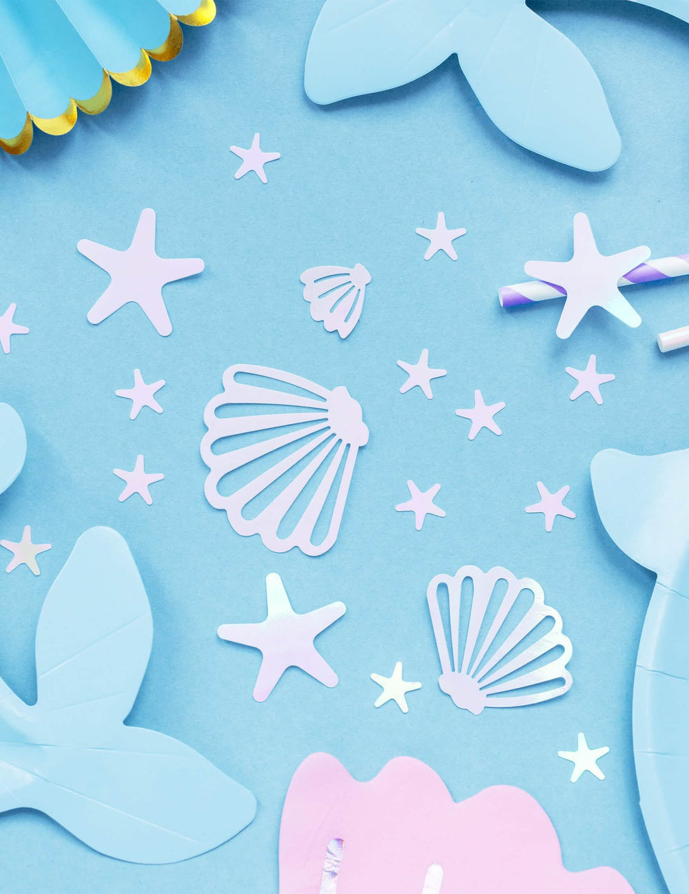 Mise en situation des confettis de table coquillages et étoiles de mer iridescents