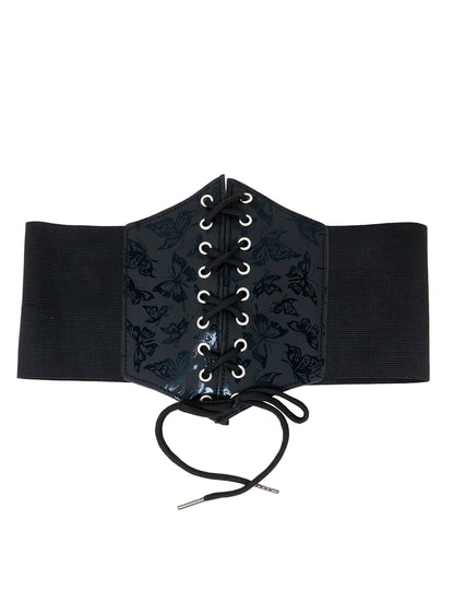 Gros plan sur le laçage frontal du corset élastique motif papillon