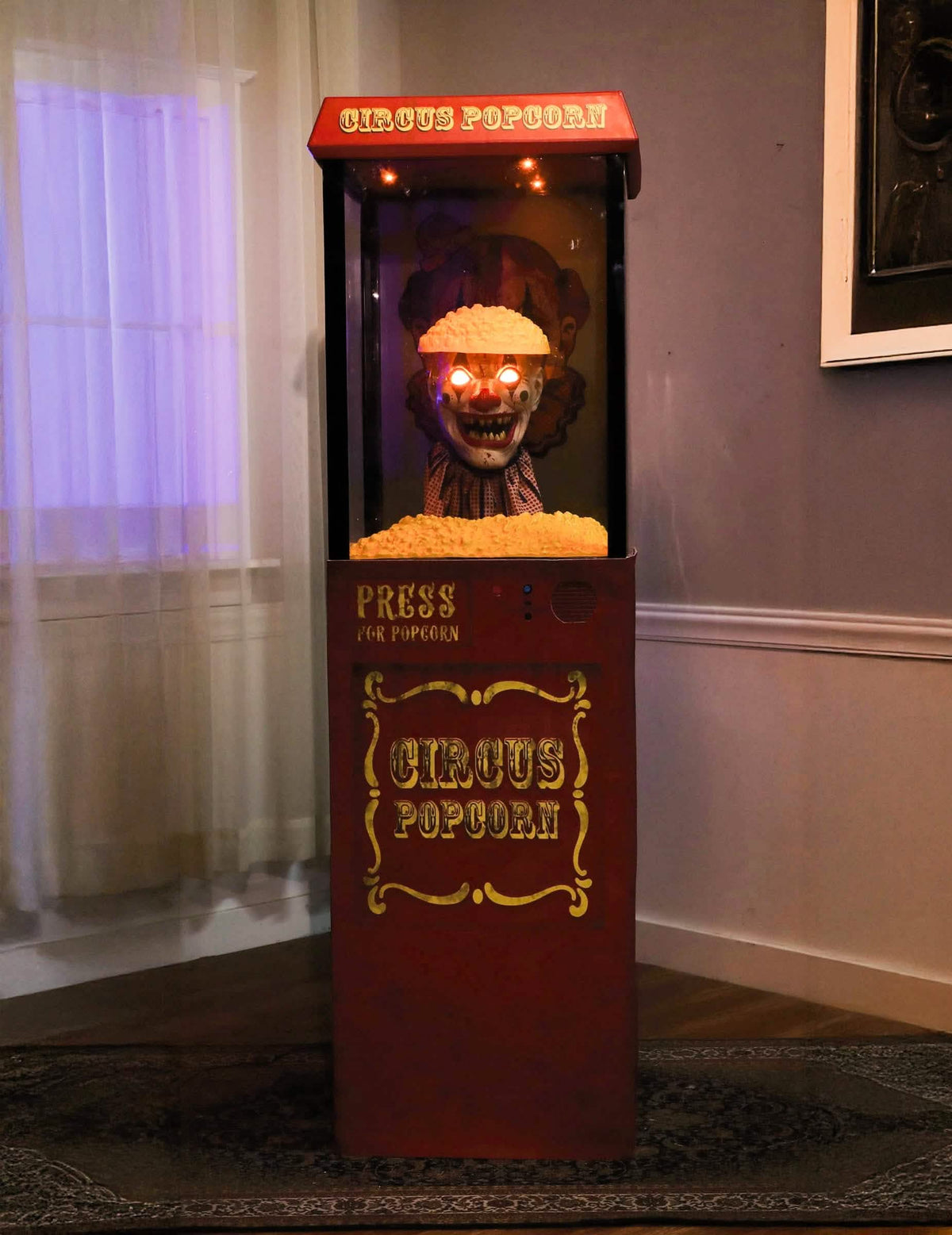 Mise en situation de la décoration animée Distributeur de Pop-Corn Clown Effrayant
