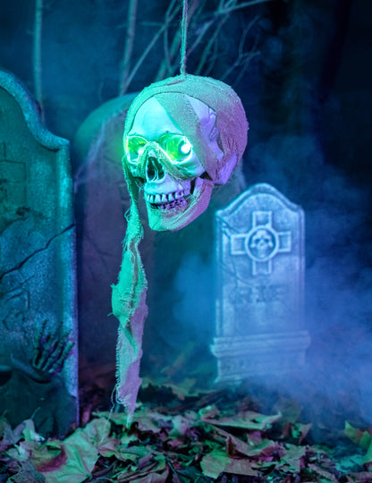 Effet lumineux des yeux verts de la décoration lumineuse tête de mort pirate à suspendre