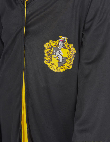 Détail de l'écusson du déguisement classique Poufsouffle Harry Potter™ enfant