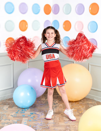 Pose de face en pied avec pompons du déguisement pompom girl USA