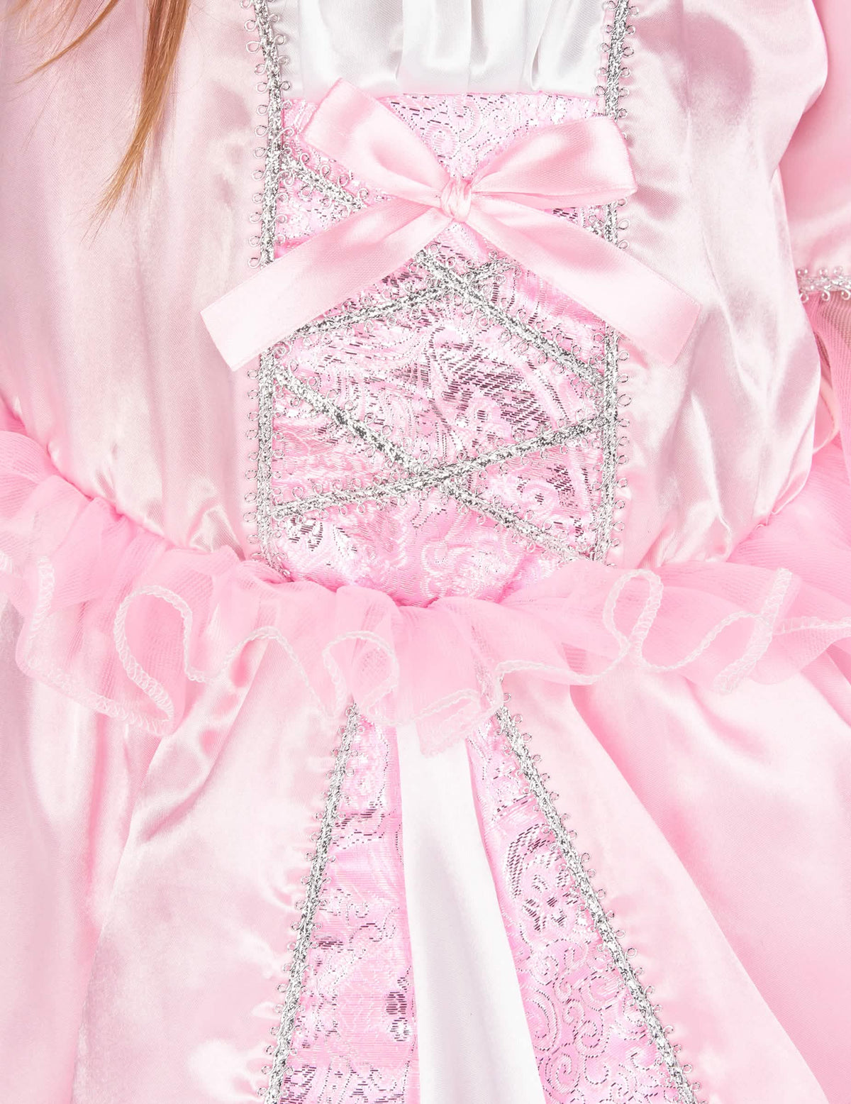 Détail du bustier rose avec nœud et liserés argentés du déguisement de princesse avec couronne à fleurs