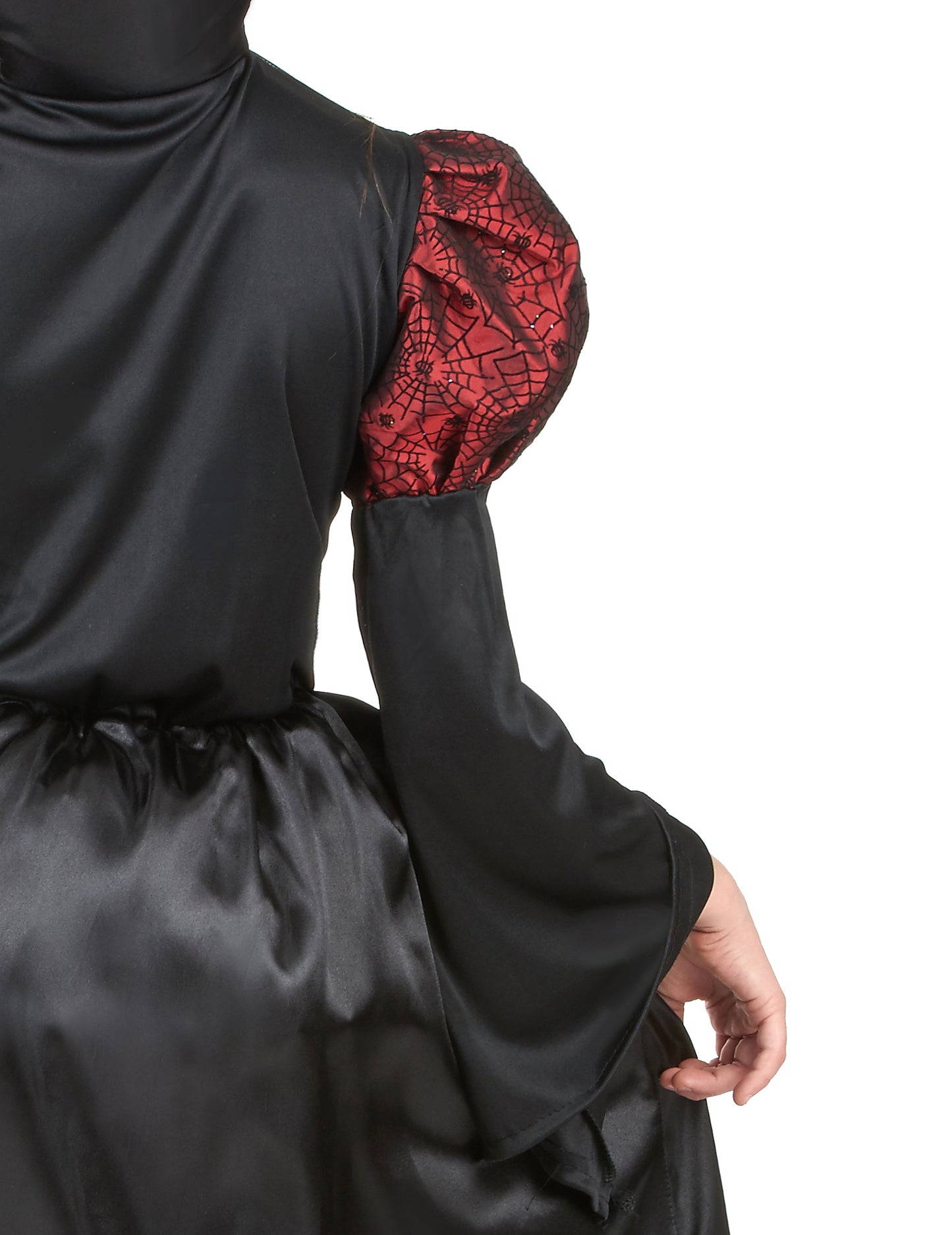 Détail de la manche à motifs toiles d'araignée du déguisement vampire manches bouffantes