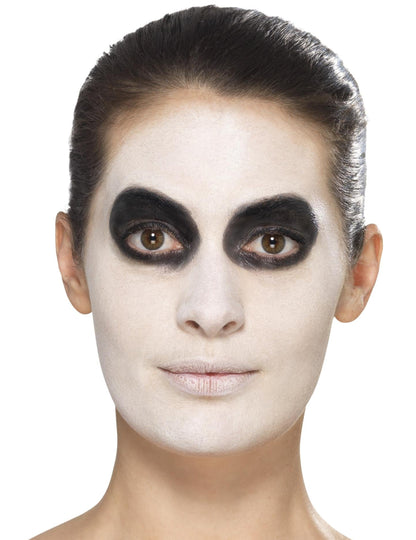 Base de maquillage blanche et noire du kit maquillage glamour avec faux cils et bijoux Dia de los muertos