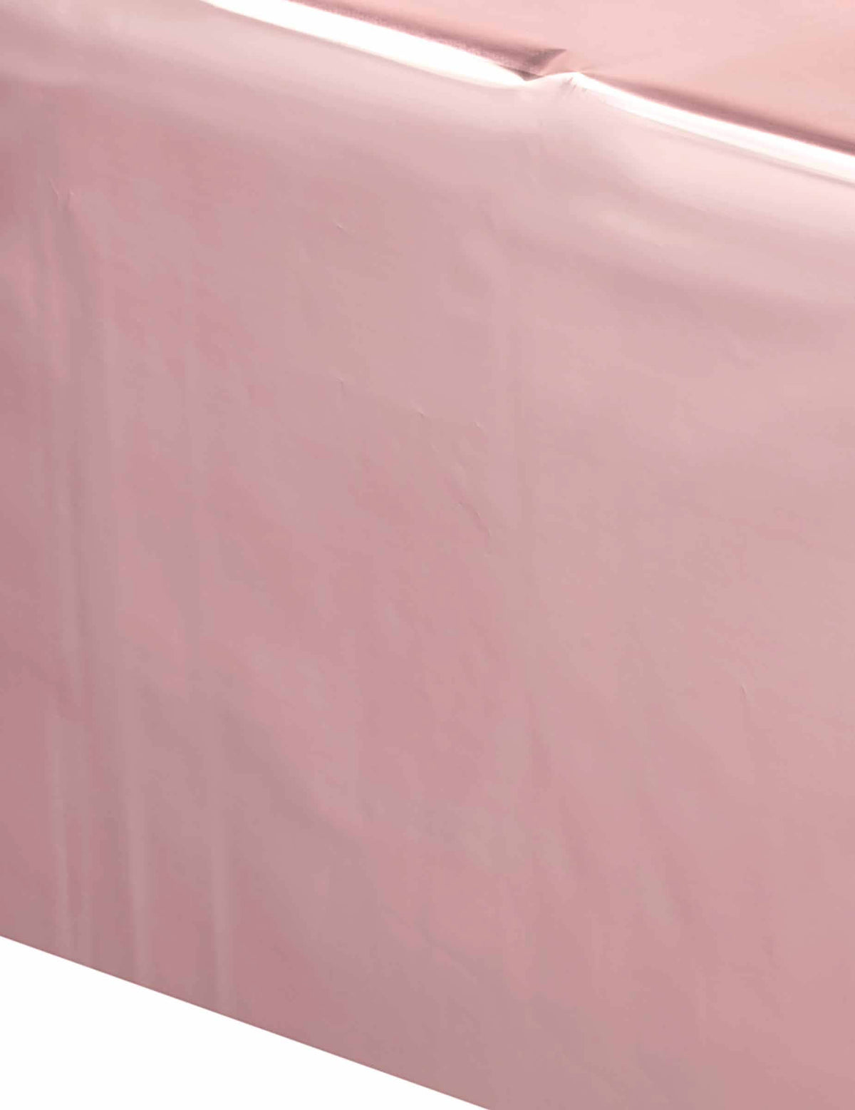 Gros plan sur la matière de la nappe en plastique rose gold pour fête