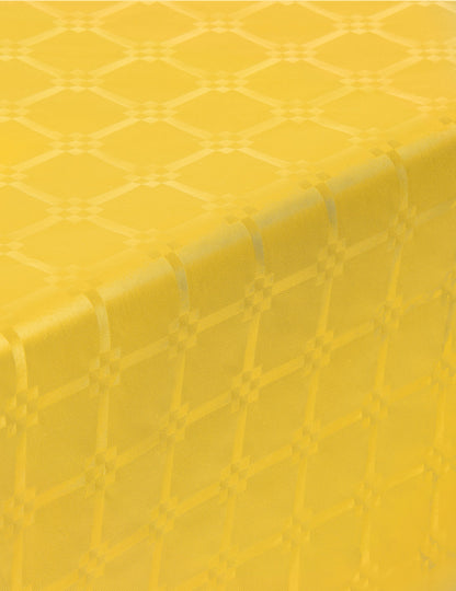 Gros plan sur le motif de la nappe en rouleau papier damassé jaune