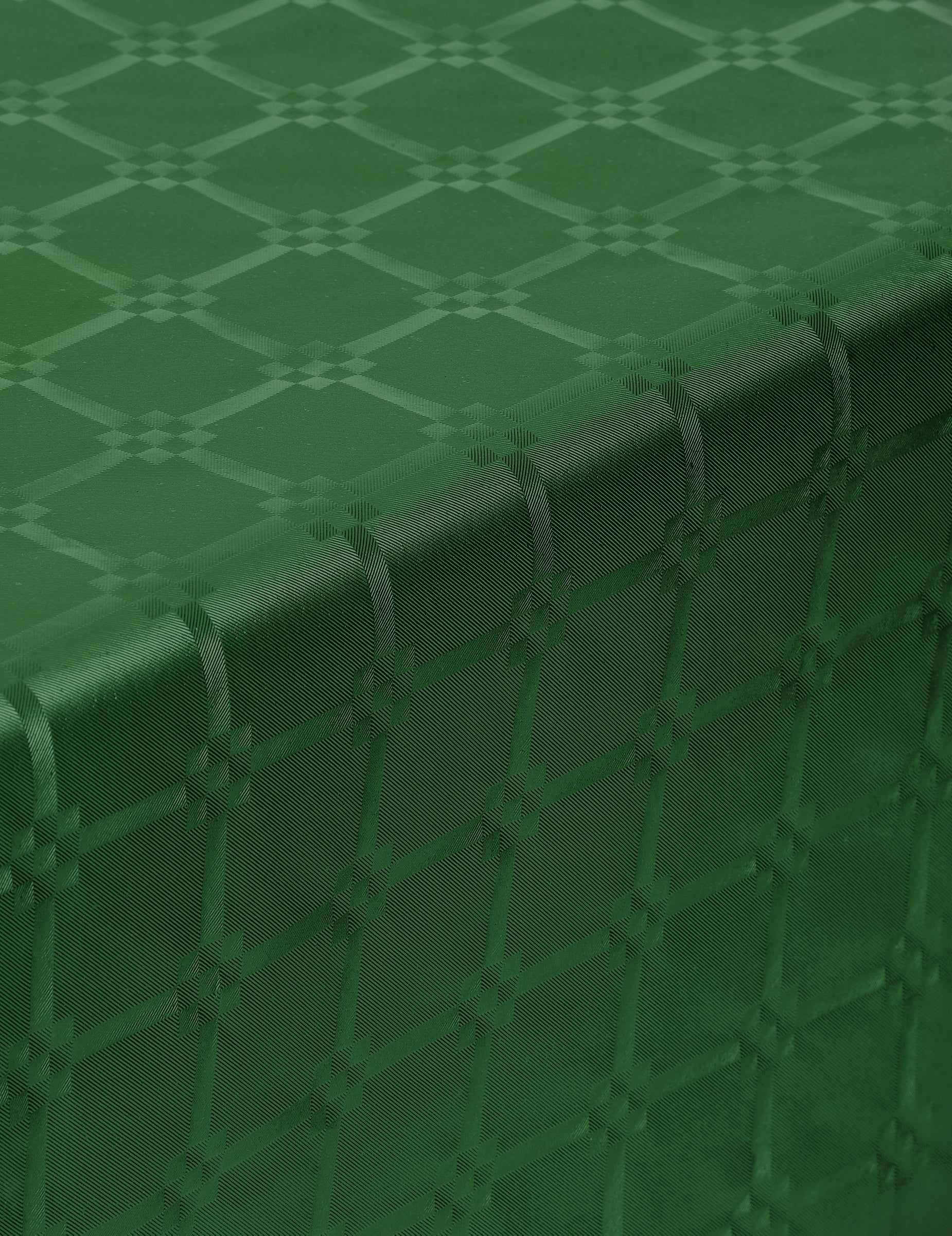 Détail de la texture damassée de la nappe en rouleau papier damassé pour fête vert foncé