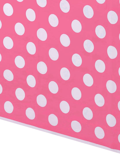 Détail du motif de la nappe plastique à pois rose et blanc