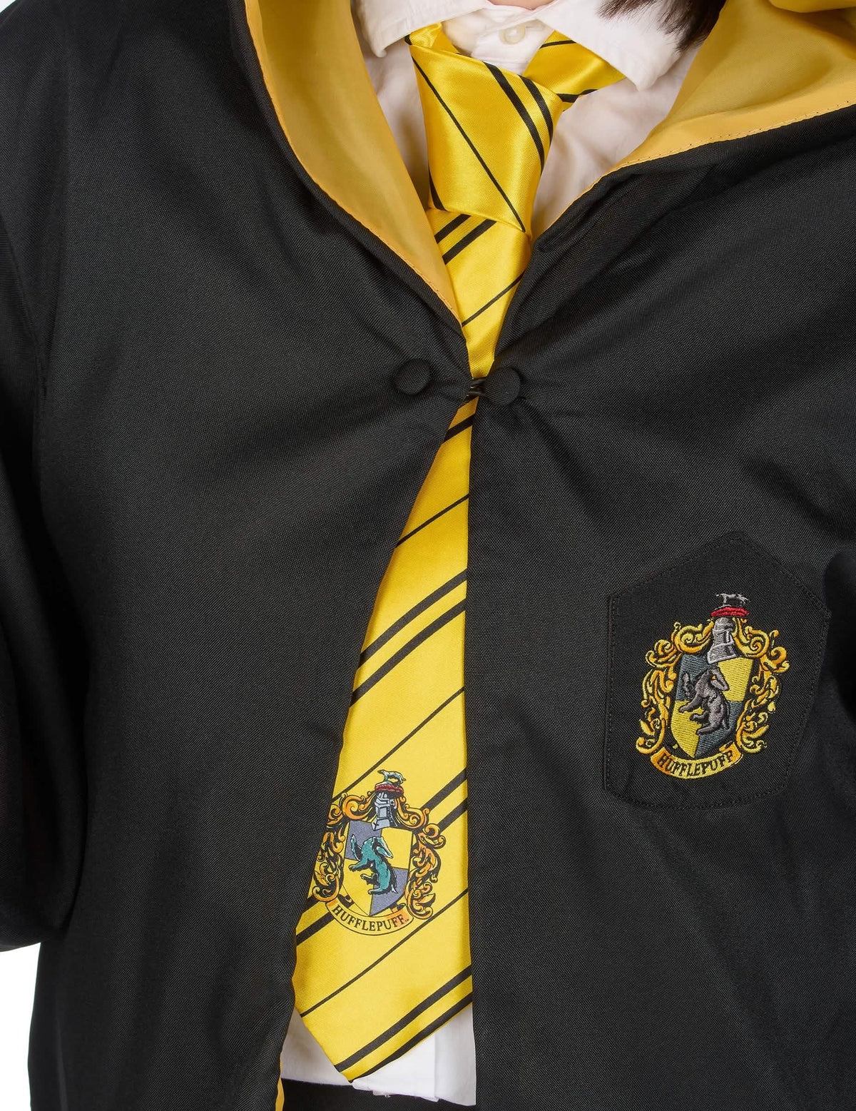 Détail de la cravate et de l'écusson du Réplique luxe robe de sorcier Poufsouffle